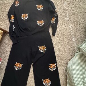 Dressed in lala tiger playsuit